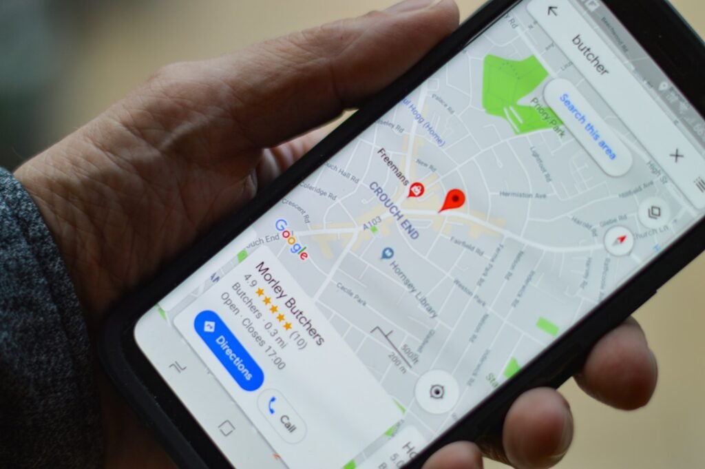 Person checking local SEO and Google search results on a smartphone for a small business in Windsor, Ontario